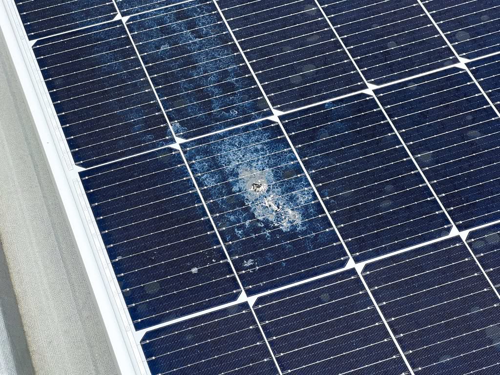 Solar Panel Cleaning in Florida: Prevent Cell Damage (2026) 2 A close-up photograph of a damaged solar panel cell showing cracking and surface deterioration, requiring professional solar panel repair services in Phoenix, AZ.
