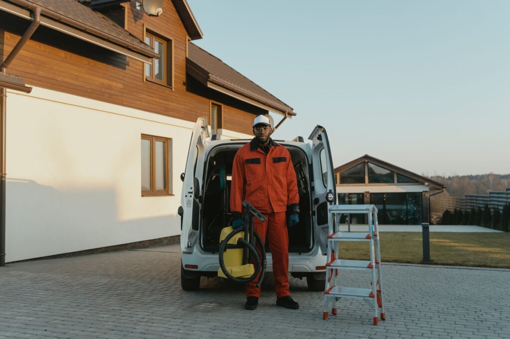 The Best Pavement Cleaner Limestone Creek FL Homeowners Trust in 2026 1 pavement cleaner limestone creek fl technician power washing a stained residential driveway