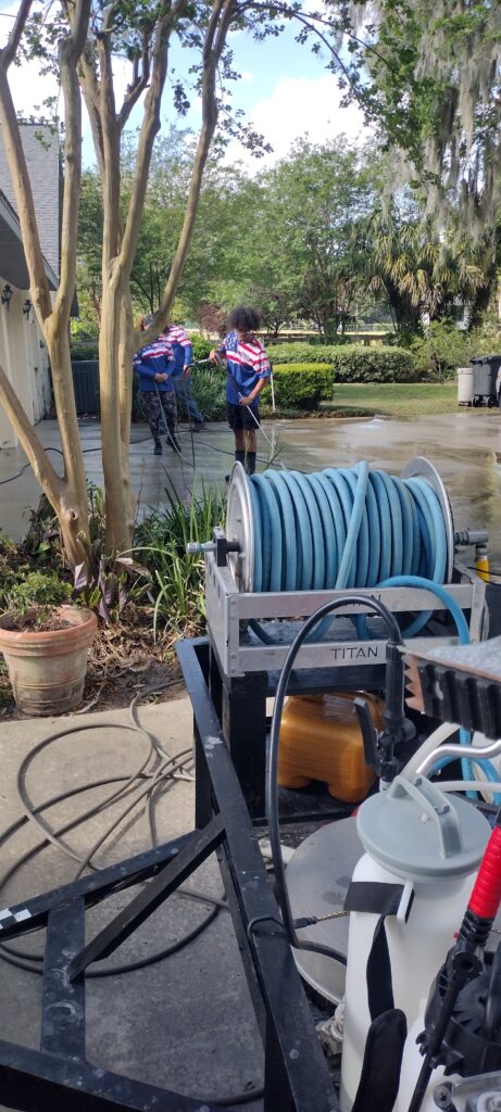 concrete driveway pressure washing before and after in Ocala FL
