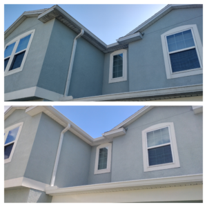 technician performing low-pressure house washing services on a stucco home in Ocala FL